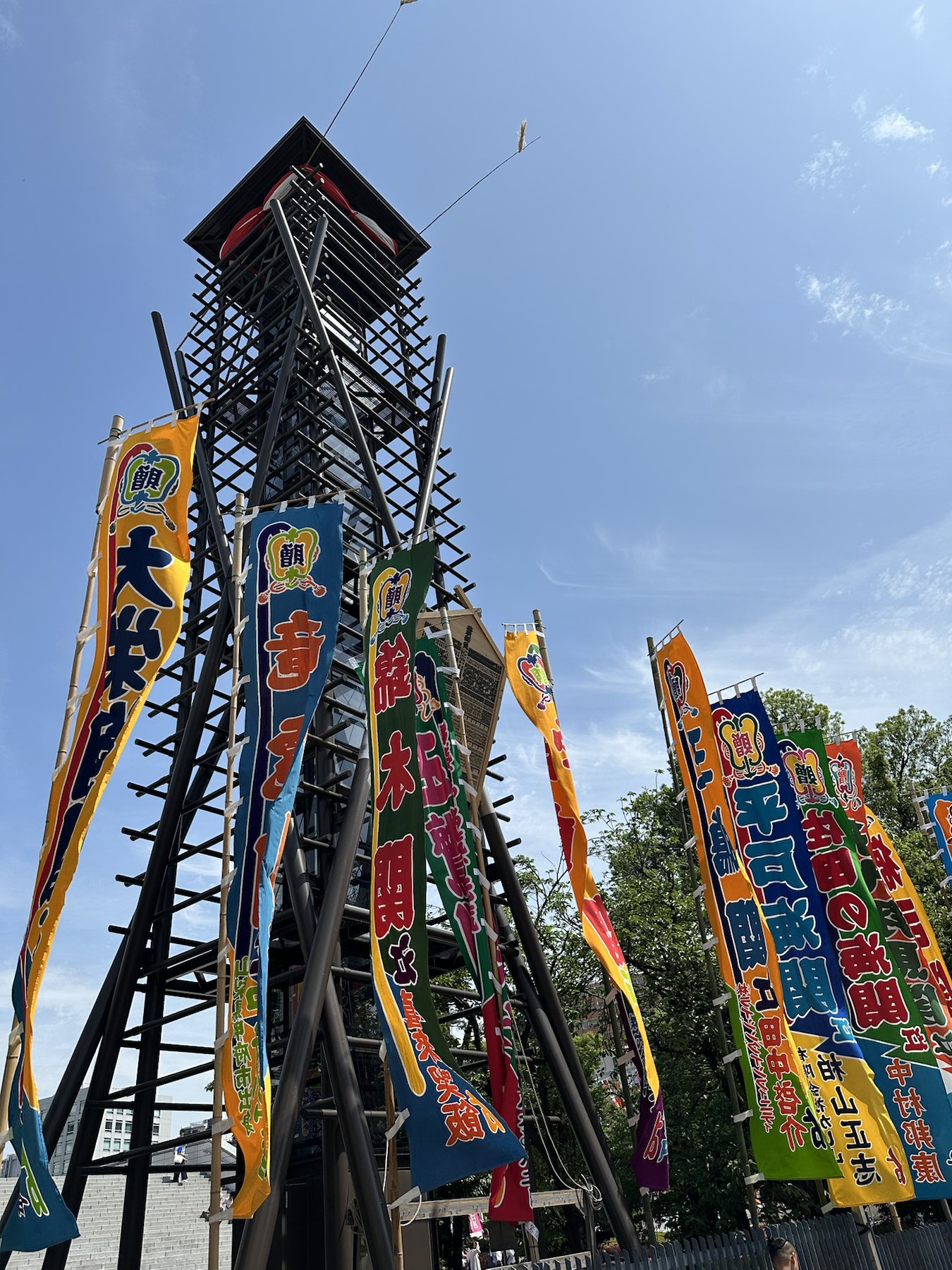 Nobori banners and the fire-watch tower outside Ryogoku Kokugikan